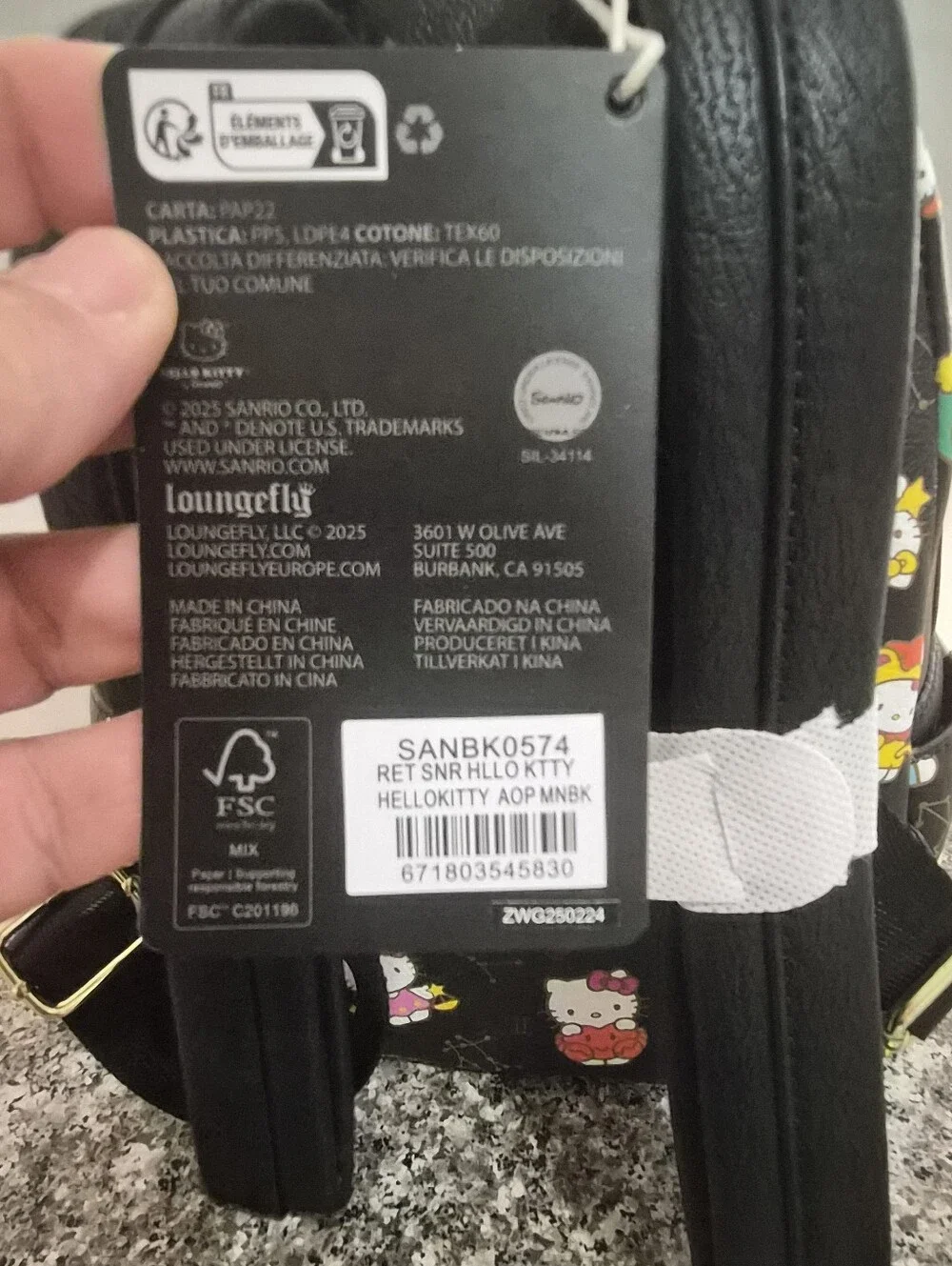 Loungefly Hello Kitty All Over Print Mini Backpack.